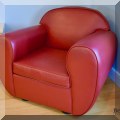F41. Red leatherette arm chair. 